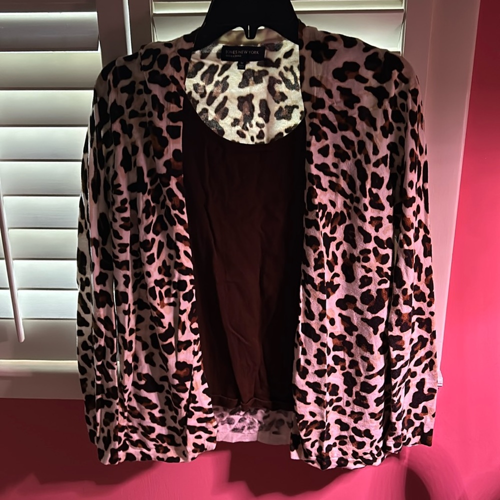 Tank top tied into a sweater, really nice animal print